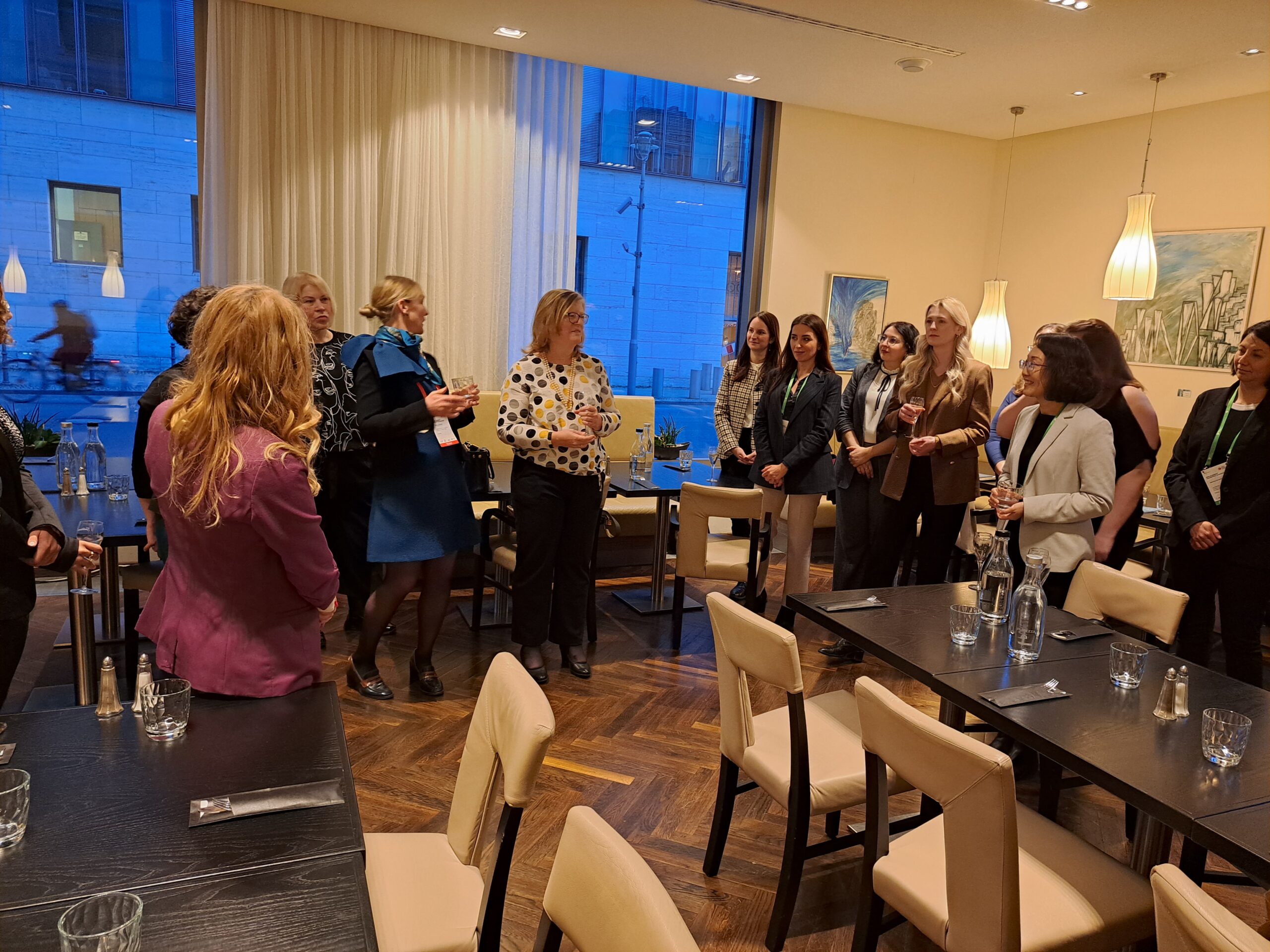 BETD Networking dinner Women gathered around tables at a networking dinner, listening to the speaker